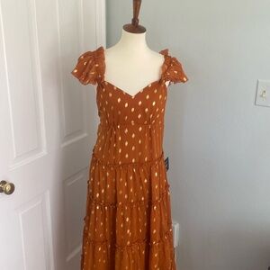 Long orange and gold polka dot dress